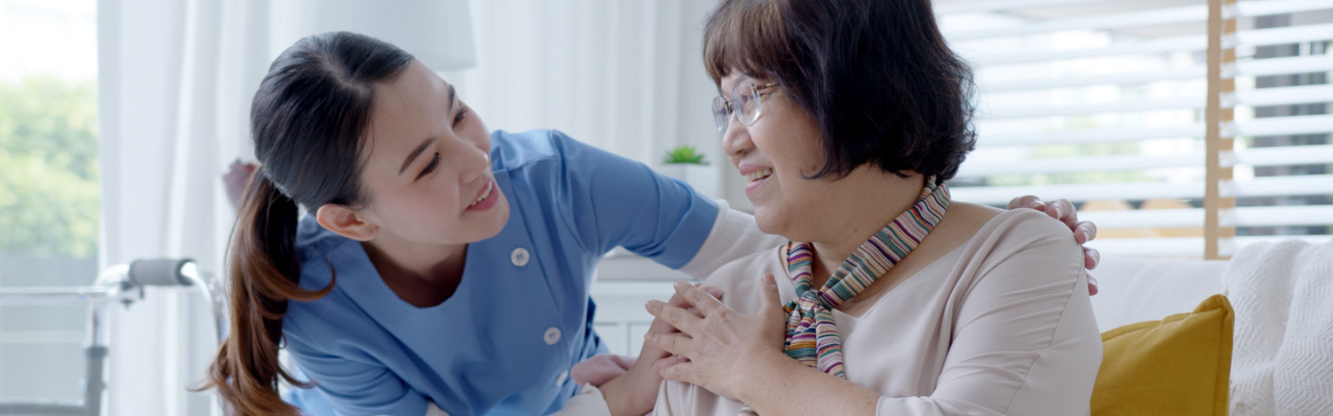 nurse comforting senior