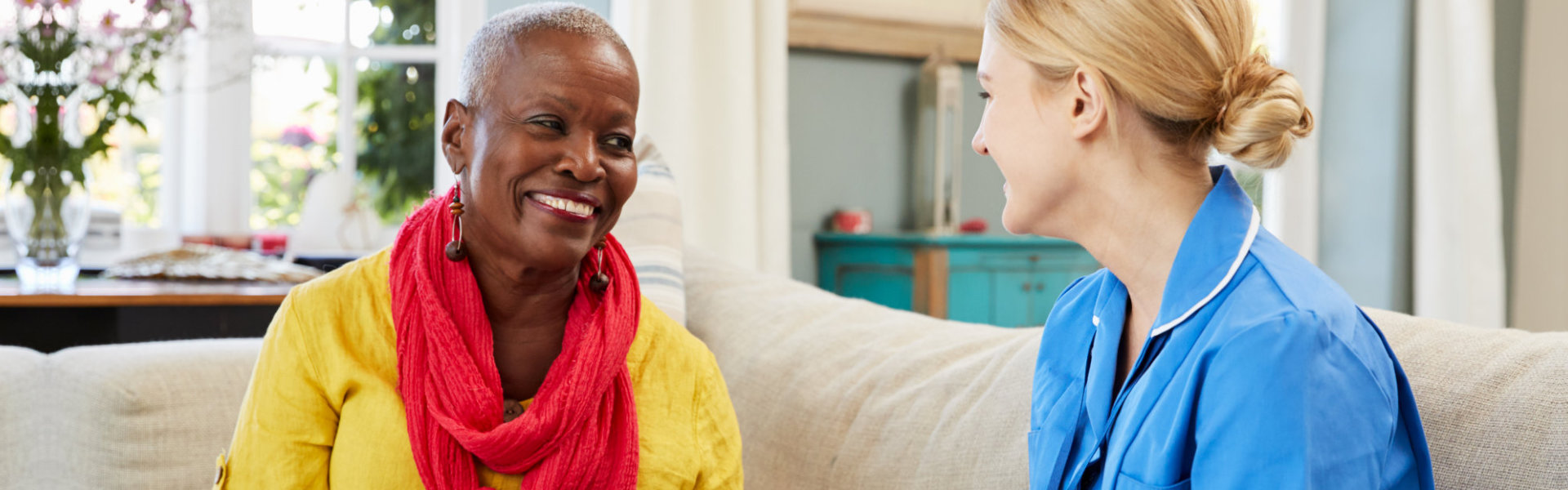 senior talking to nurse